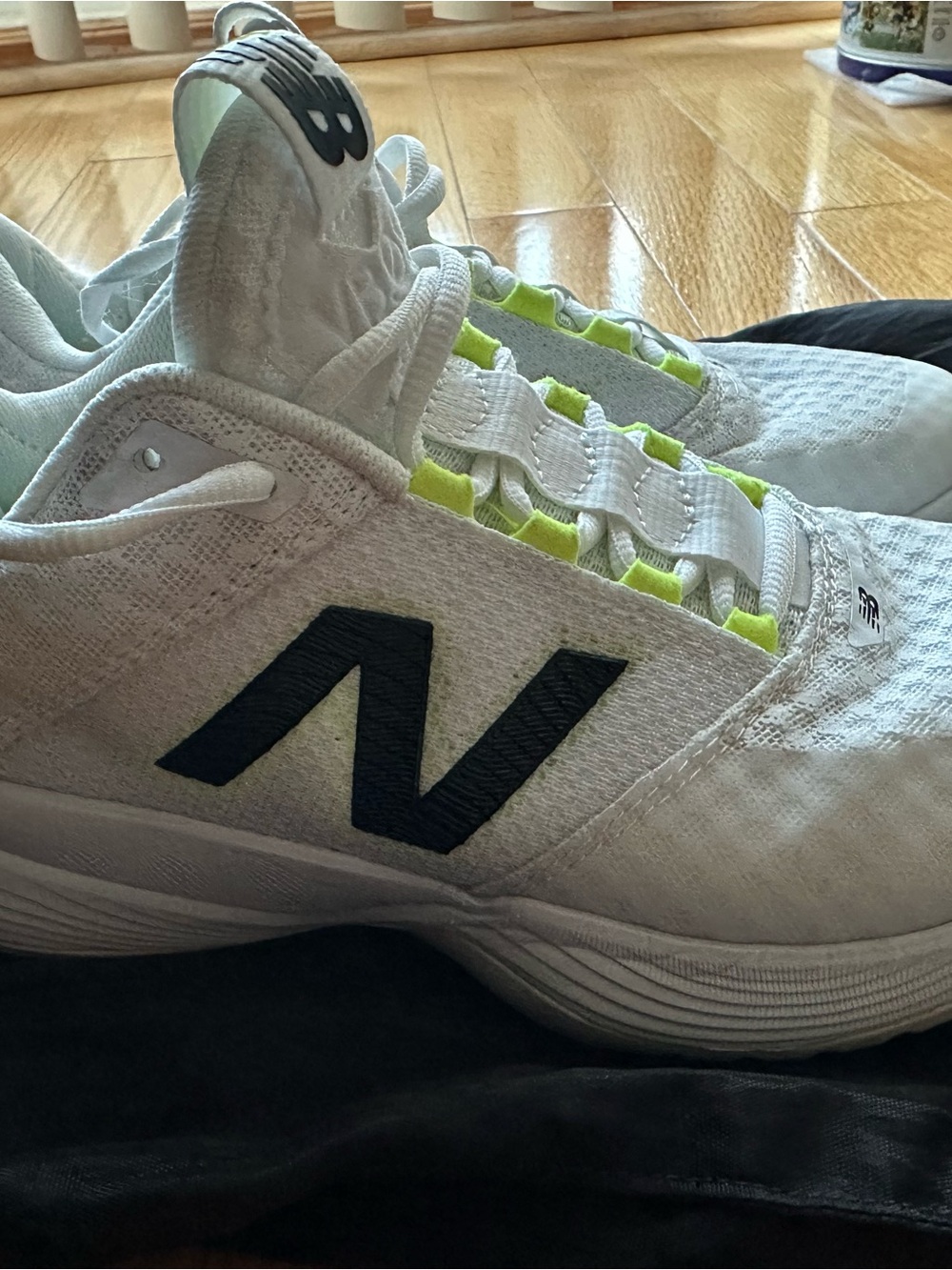 New Balance White Court Sneakers with Black N and Neon Yellow Accents